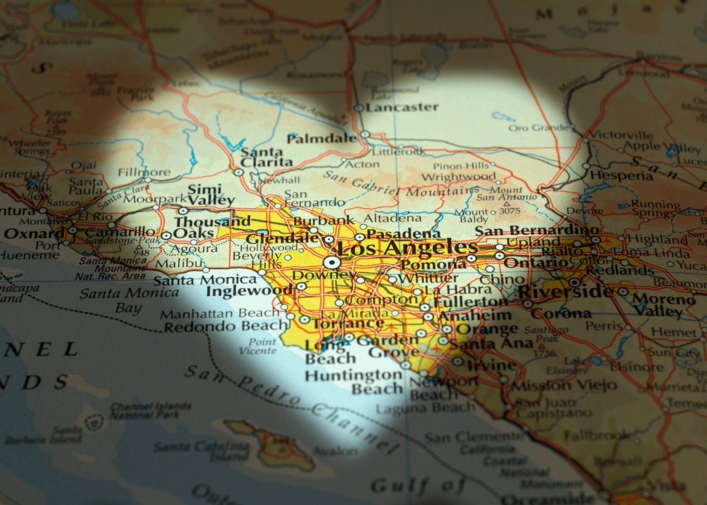 Map of Southern California with the Los Angeles area highlighted in yellow and surrounding cities visible.